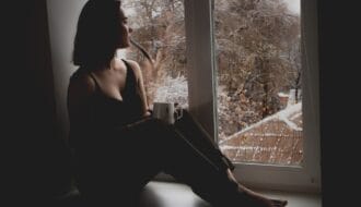 depression girl looking out window