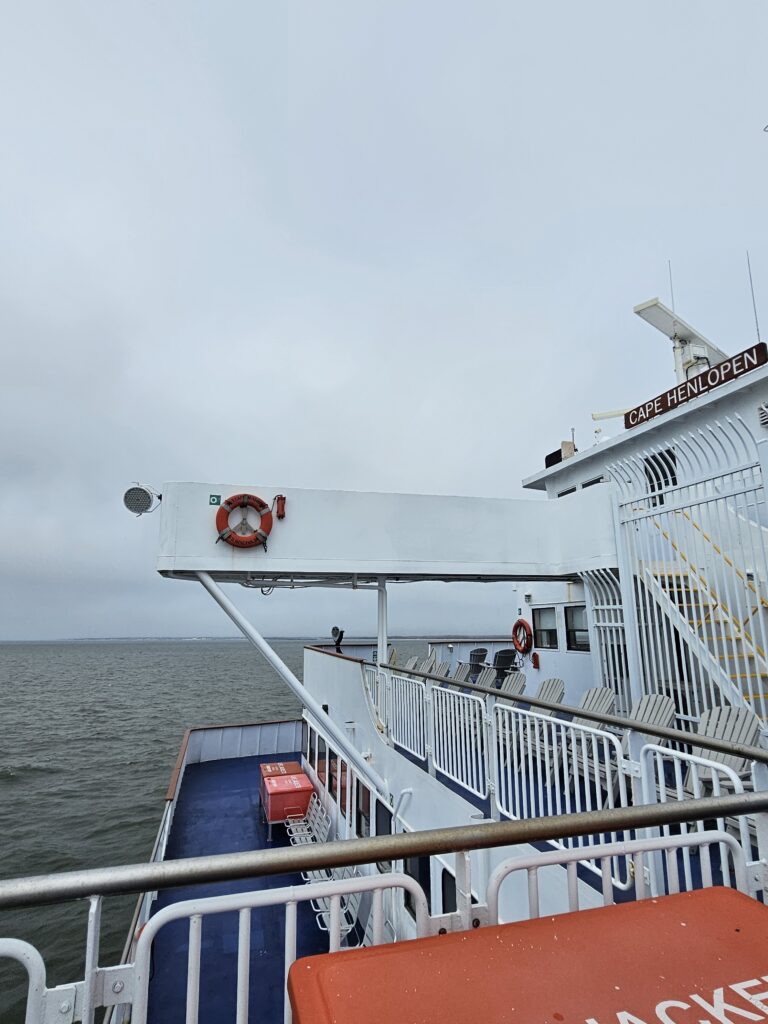 View from the Cape May-Lewes Ferry crossing the Delaware Bay on an overcast April day.  an ocean of grief